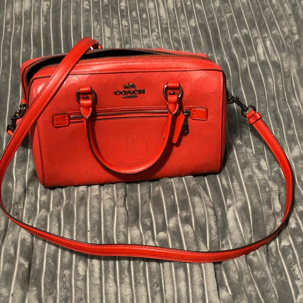 Coach Rowan leather satchel or crossbody in red.